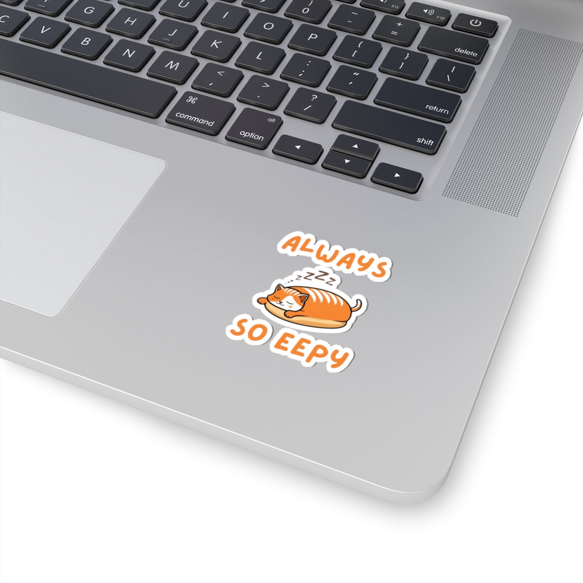 2x2 white cute always so eepy loaf cat sticker with orange eepy cat design on a laptop