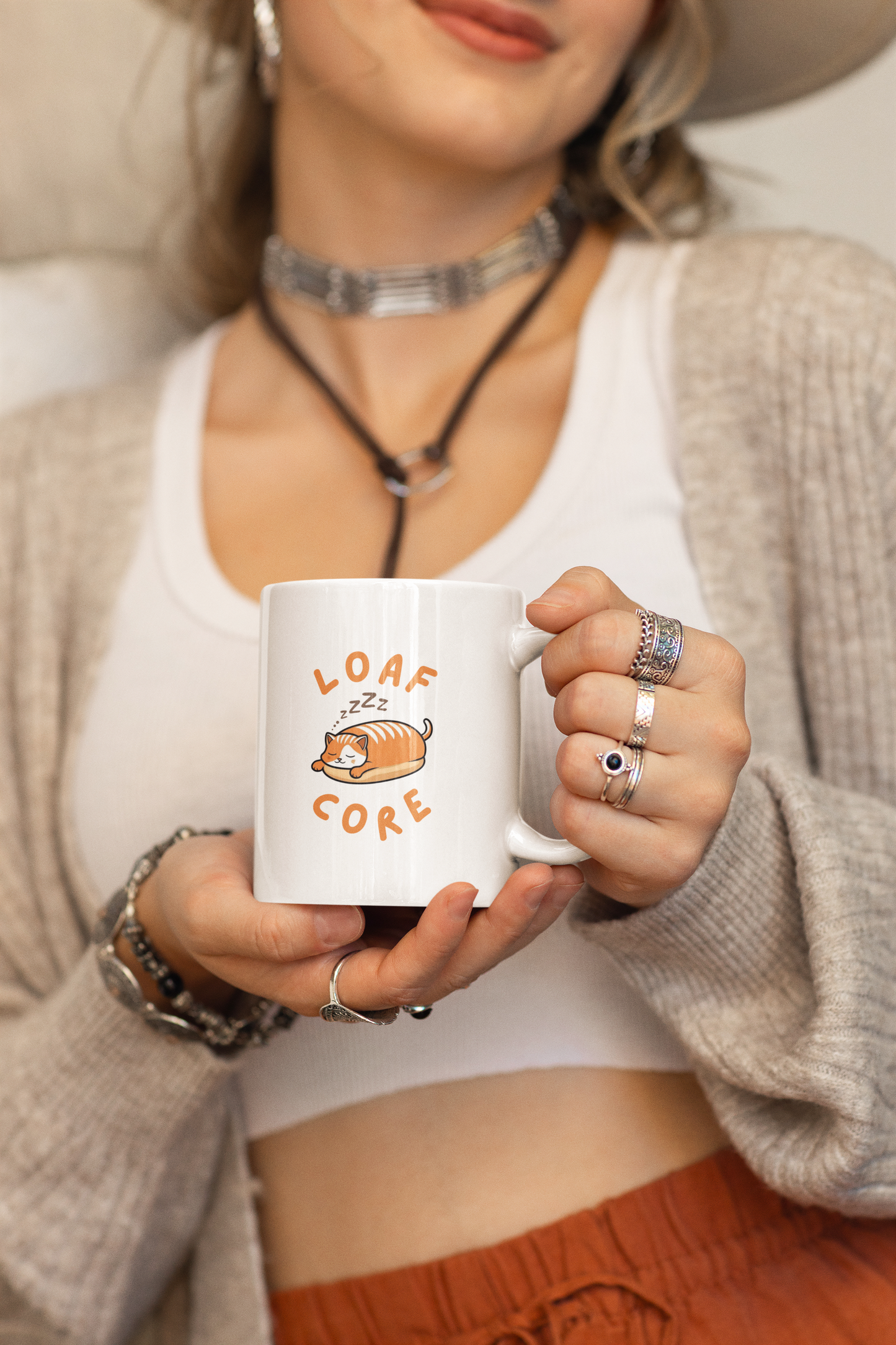 Lifestyle image of ceramic loaf cat mug