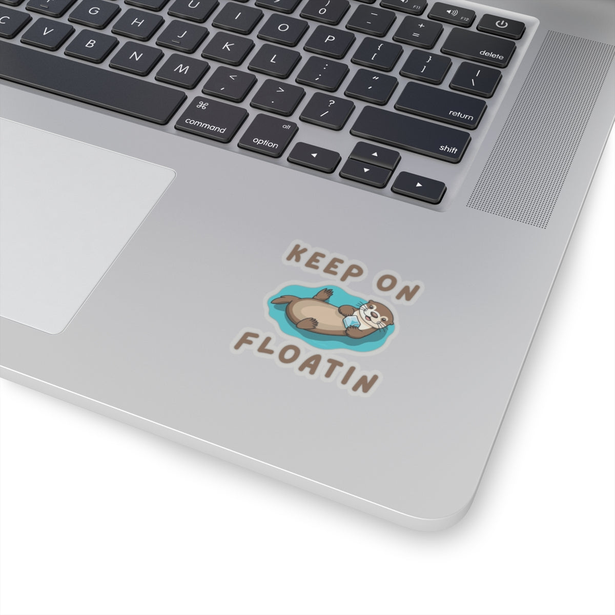 2x2 transparent Otter Core Keep On Floatin sea otter sticker on laptop – cute vinyl animal sticker