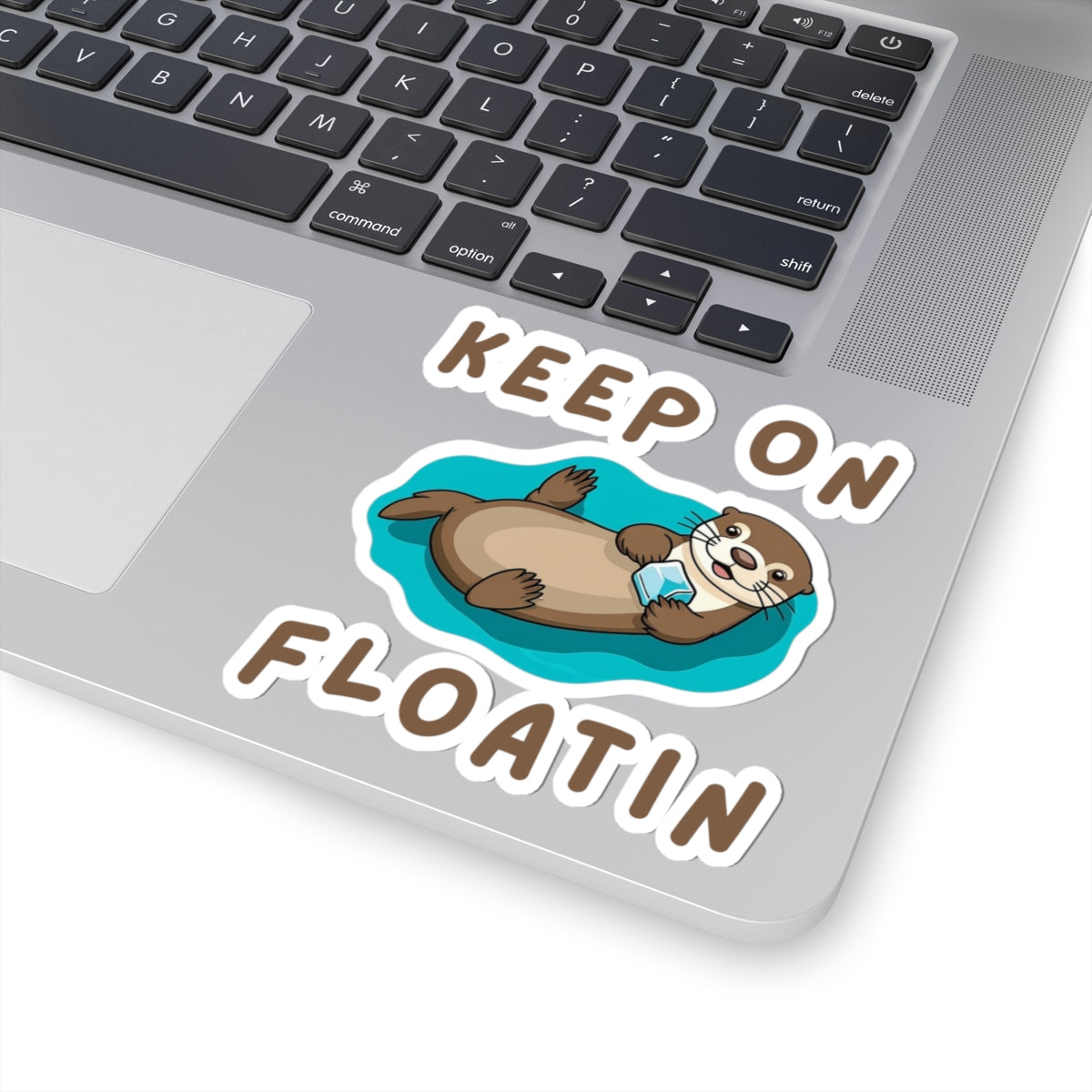 4x4 white Otter Core Keep On Floatin sea otter sticker on laptop – cute vinyl animal sticker