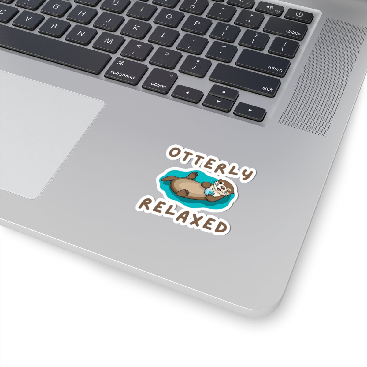 2x2 white Otter Core Otterly Relaxed sea otter sticker on laptop – cute vinyl animal sticker
