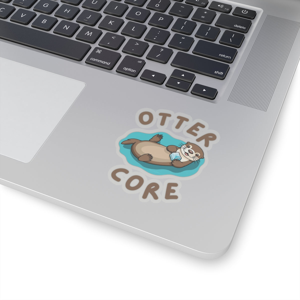 3x3 transparent Otter Core sea otter sticker on laptop – cute vinyl animal sticker