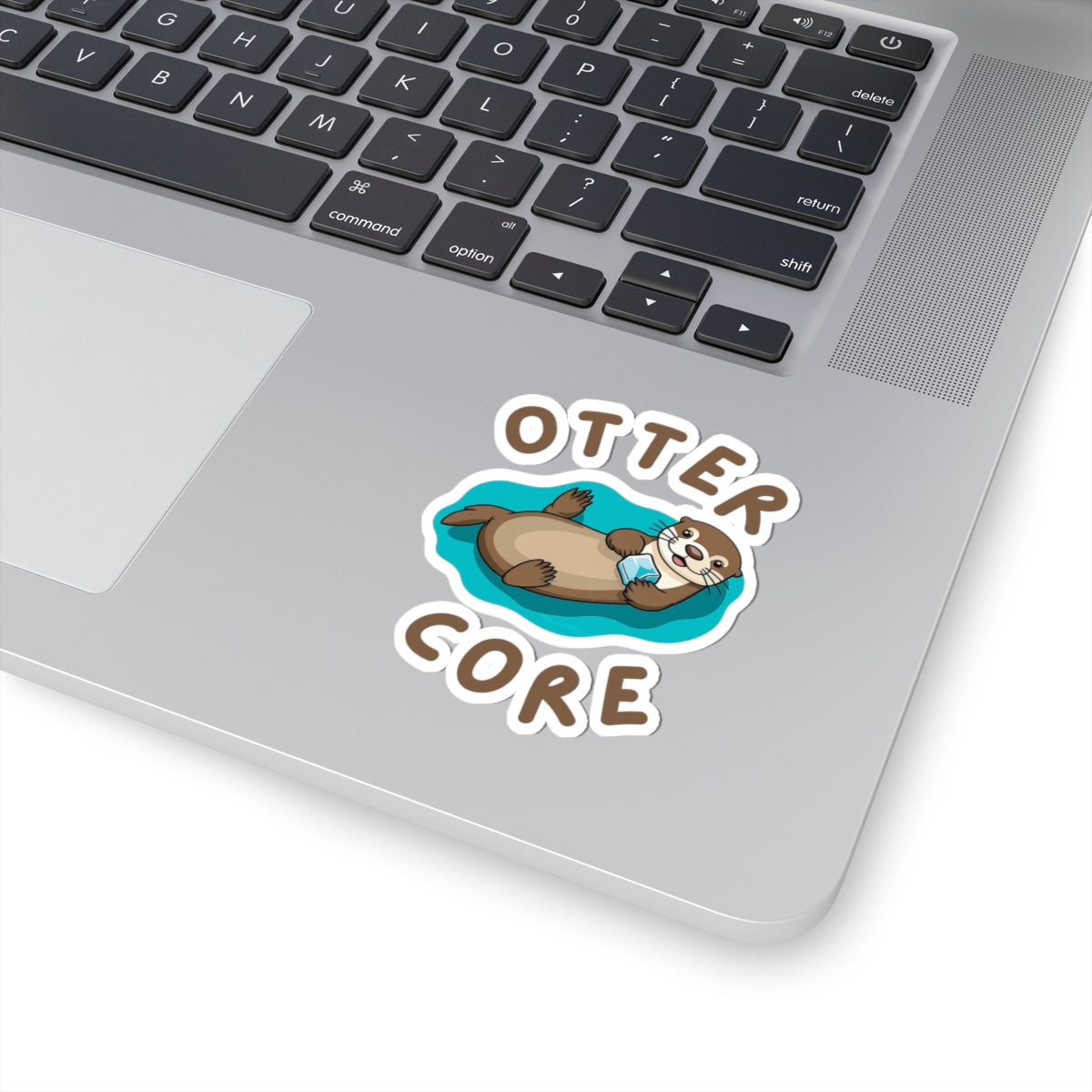 3x3 white Otter Core sea otter sticker on laptop – cute vinyl animal sticker