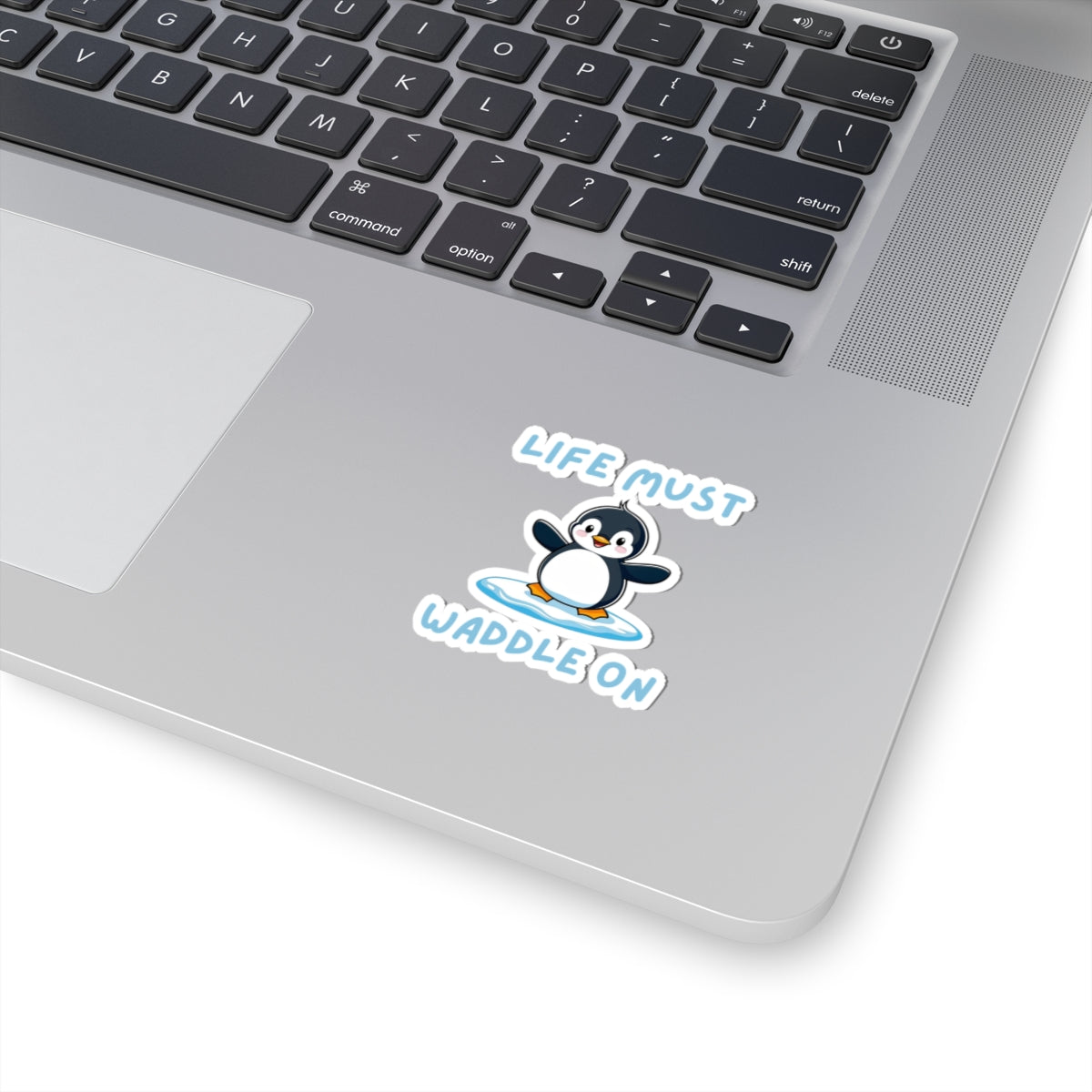 White 2x2 Penguin Core Life Must Waddle On kiss-cut sticker with cute penguin design – perfect for animal lovers - on laptop