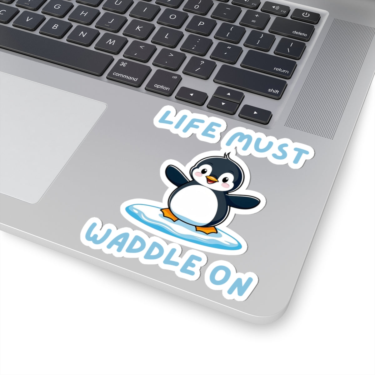 White 4x4 Penguin Core Life Must Waddle On kiss-cut sticker with cute penguin design – perfect for animal lovers - on laptop
