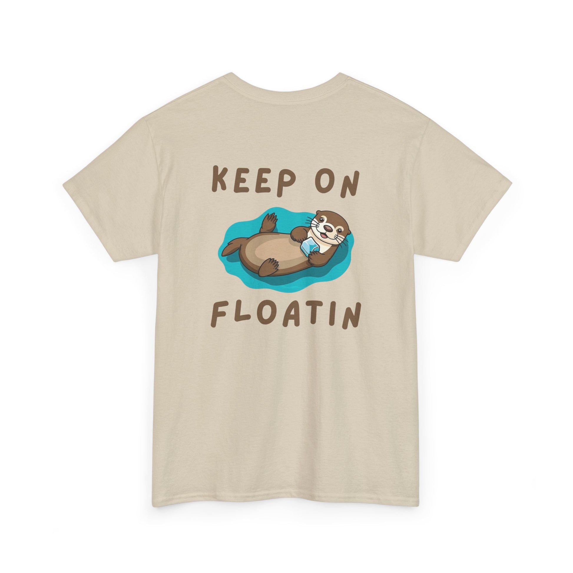 Back view of sand Keep on Floatin Otter Core t-shirt with sea otter design
