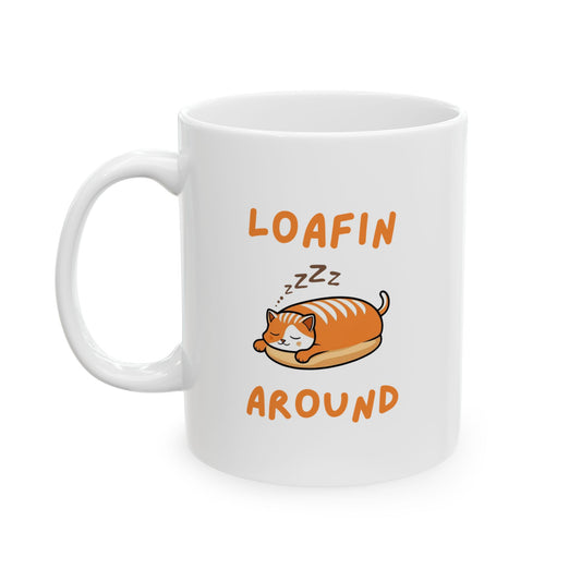 Handle on the left view of Loaf Core Loafin Around cat mug with eepy cat design