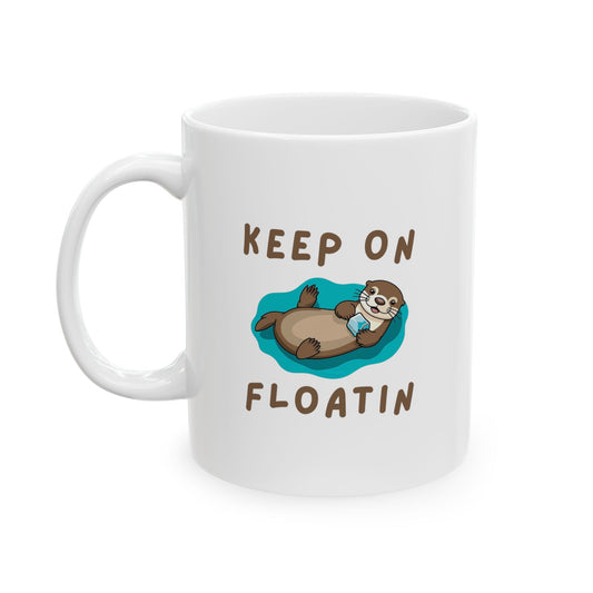 Handle on the left view of Keep On Floatin Otter Core mug with sea otter design
